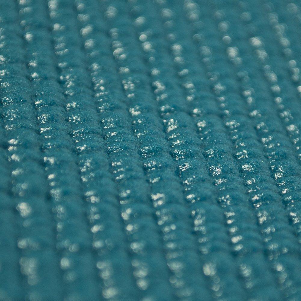 Alabaster OMSutra Studio Yoga Mat 6mm Deluxe laid flat, showing textured surface, ideal for yoga and fitness activities.