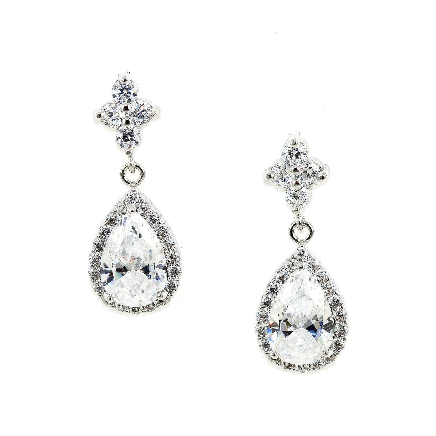 Cyan Ismene teardrop crystal chandelier earrings with sparkling gemstones and intricate silver settings.