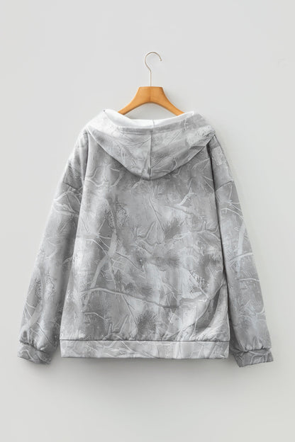 Plus size camouflage woodland hoodie by Byzantium Bay, oversized sweater with camo print, soft fabric, and relaxed fit.