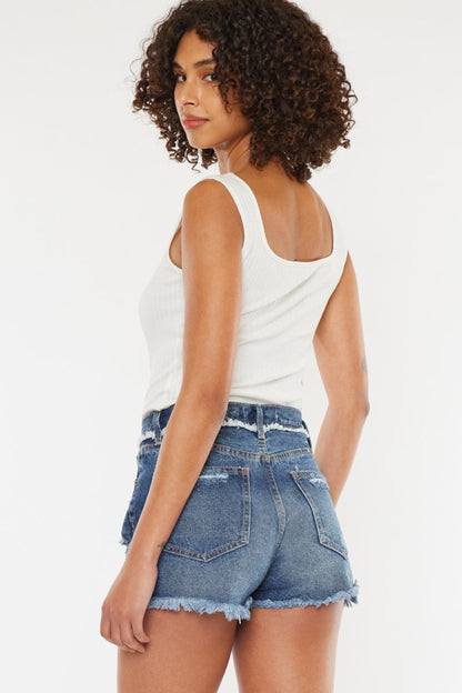Jade Icarus Kancan distressed button fly denim shorts for women, featuring frayed hems and classic five-pocket design.