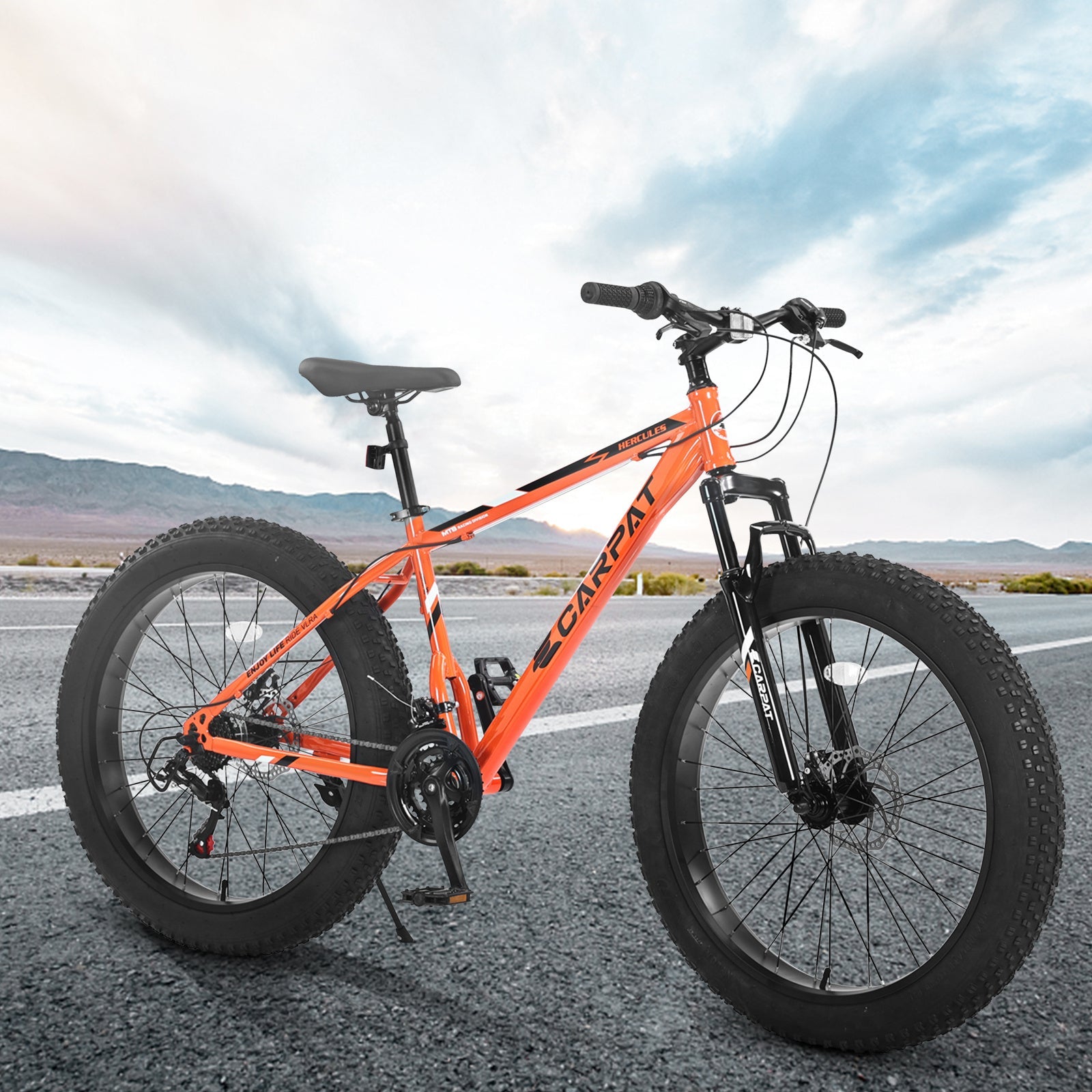 Carmine Juneberry TerraForce City-Cruizer 26-inch fat tire mountain bike with 21-speed gear and full suspension.
