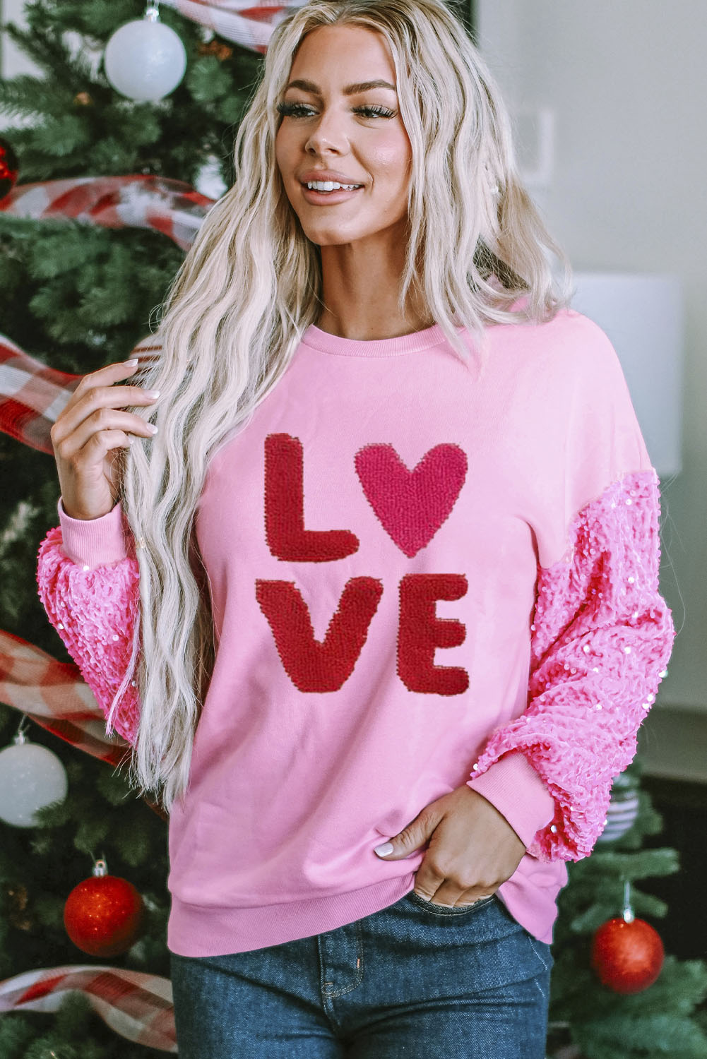 Pink Valentines LOVE Chenille embroidered sequin sleeve sweatshirt by Harlequin Daisy, featuring embroidered love message and shiny sequin sleeves.