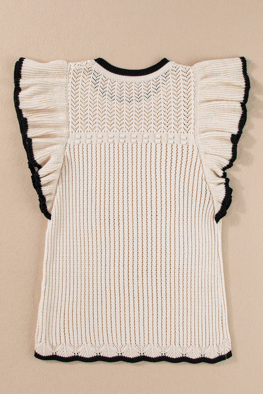 Apricot crochet eyelet flounce tank top by Carmine Juneberry, featuring delicate eyelet details and a flowing silhouette.