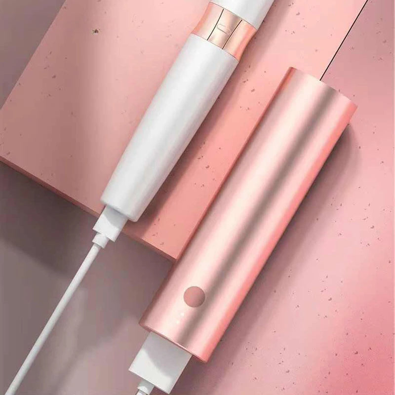 Maroon Asteria electric eyebrow trimmer with USB charging, portable hair removal razor for precise grooming and hair removal.
