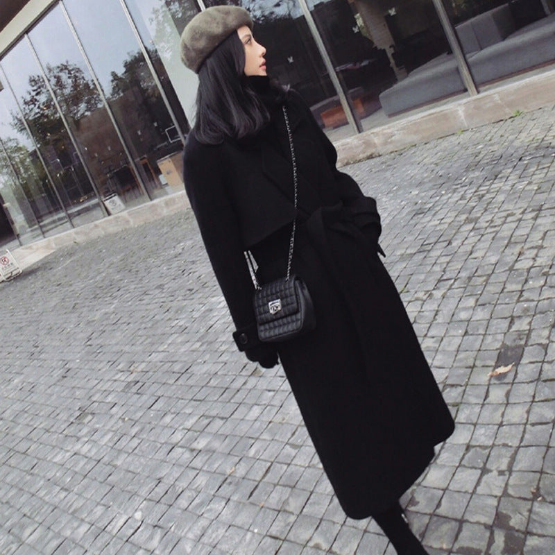 Black silhouette overcoat from Carmine Juneberry&