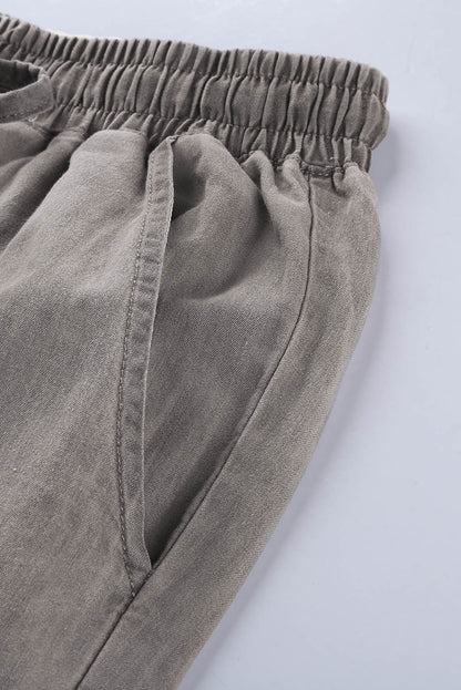 Gray drawstring cargo pocketed joggers for women by Lavender Pallas, featuring a relaxed fit and casual style.