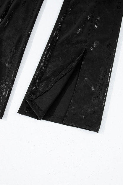 Black faux leather splits high waist leggings by Carmine Juneberry, featuring a sleek fit and stylish design.