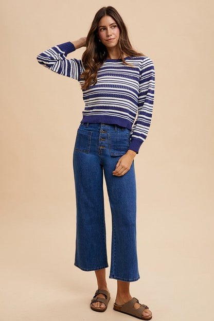 Jade Icarus Annie Wear button fly high waist jeans, automotive-themed design with detailed stitching and classic denim texture.
