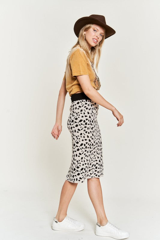 Jade Icarus animal print sweater skirt for women, featuring a stylish and cozy design with bold animal print pattern.