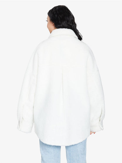 Rose Eleusis oversized patch pocket Borg teddy shacket with a cozy, textured fleece exterior and relaxed fit, shown on a hanger.