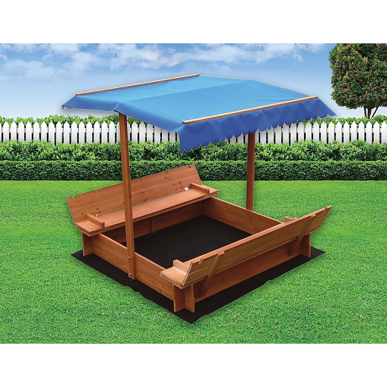 Kids wooden toy sandpit with canopy by Magenta Danae, featuring a wooden structure and colorful sand for outdoor play.