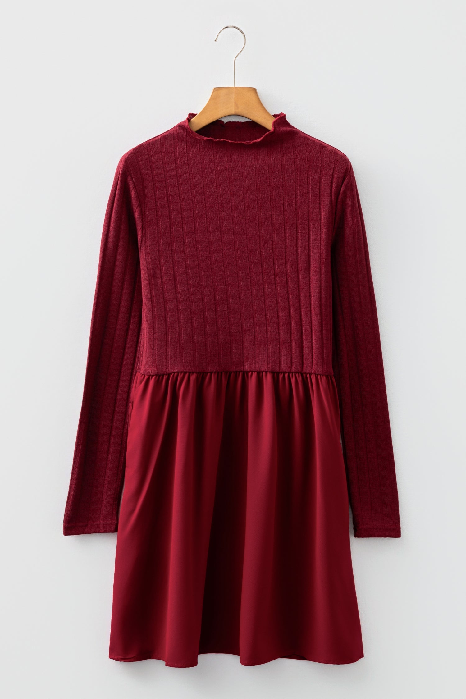 Byzantium Bay ribbed knit patchwork long sleeve dress featuring a fitted silhouette and textured fabric in a stylish design.