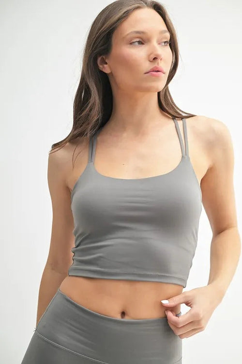 Jade Icarus Mono B Venice Cloud Light Crisscross Sports Bra for women, with a soft gray and white cloud pattern and crisscross back design.