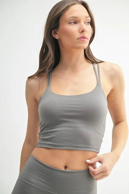 Jade Icarus Mono B Venice Cloud Light Crisscross Sports Bra for women, with a soft gray and white cloud pattern and crisscross back design.