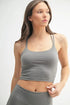 Jade Icarus Mono B Venice Cloud Light Crisscross Sports Bra for women, with a soft gray and white cloud pattern and crisscross back design.