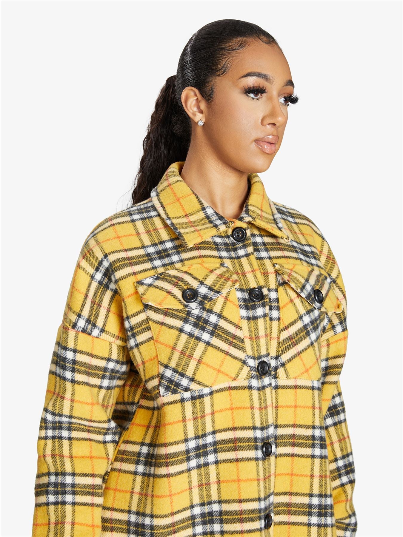 Rose Eleusis oversized Nova check wool blend shacket featuring a relaxed fit, button closure, and classic check pattern.