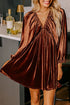 Velvet elastic V-neck mini dress with puff sleeves by Byzantium Bay, showcasing its elegant design and soft fabric.