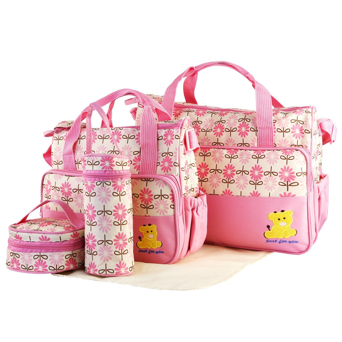 Set of five Pear Daisy baby nappy diaper shoulder bags, stylish and functional for parents carrying baby essentials.