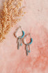 Dainty feather hoop earrings by Periwinkle Aether with delicate fringe design, perfect as stylish accessories.