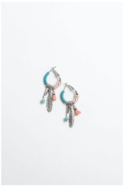 Dainty feather hoop earrings by Periwinkle Aether featuring fringe design and delicate craftsmanship, perfect for accessories.