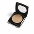 Olive Chronos Danyel Mini Concealer Compact in Soft Beige, neutral beige shade, showing the small skincare compact with smooth surface.