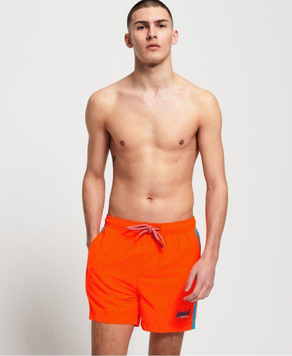 Dark orange swim shorts by Sky Felix, featuring a comfortable fit and stylish design, displayed on a plain background.