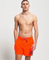 Dark orange swim shorts by Sky Felix, featuring a comfortable fit and stylish design, displayed on a plain background.