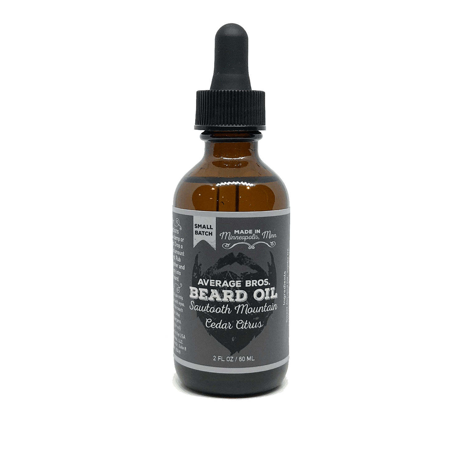 Tan Athena Sawtooth Mountain Cedar Citrus beard oil bottle with label, designed for grooming and beard care.