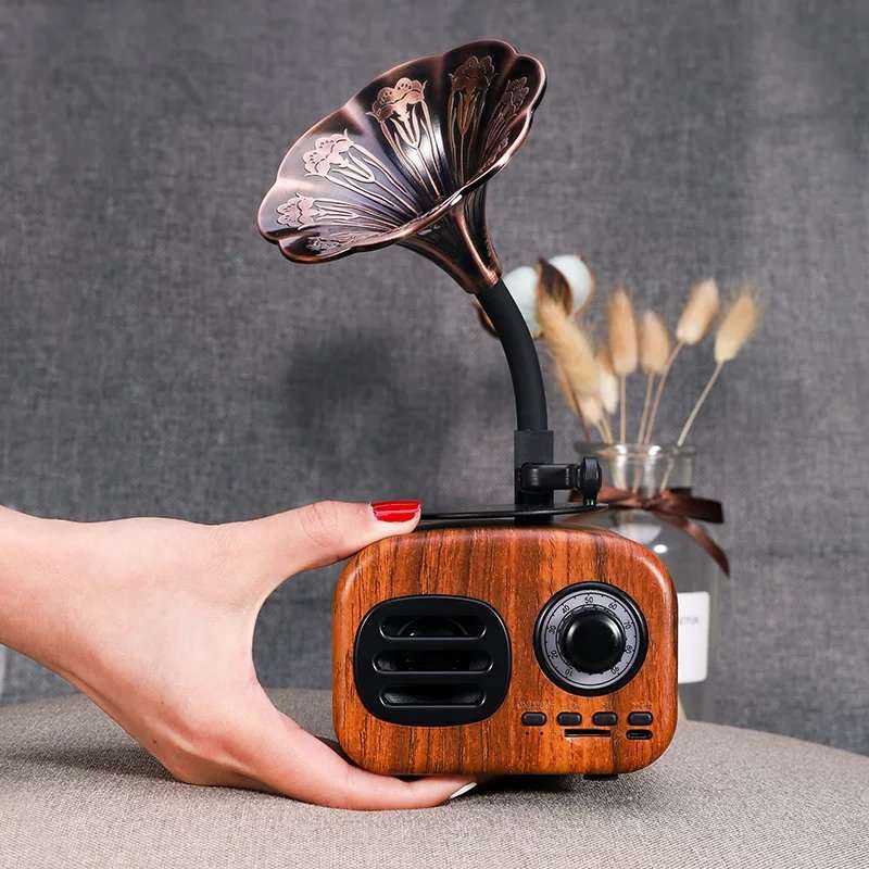 Fuchsia Molly Retro Bluetooth speaker with vintage design and control buttons on front, ideal for portable audio playback.