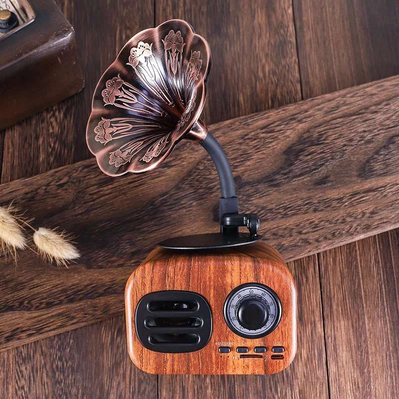Fuchsia Molly Retro Bluetooth Speaker in vibrant pink with vintage design, compact portable speaker for wireless audio.