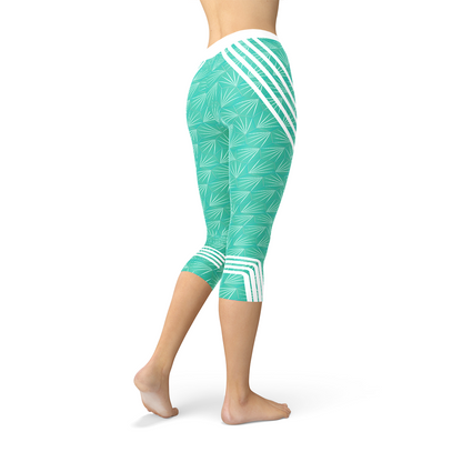 Turquoise Start2Finish sports capri leggings with a fitted design, suitable for workout and casual wear.