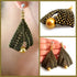 Gold metallic suede and pearl earrings by Maroon Smudge featuring elegant gold and pearl accents in a stylish design.