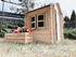 Lavender Arachne Little Bunny Playhouse for kids, colorful wooden furniture with playful bunny design and windows for imaginative play.