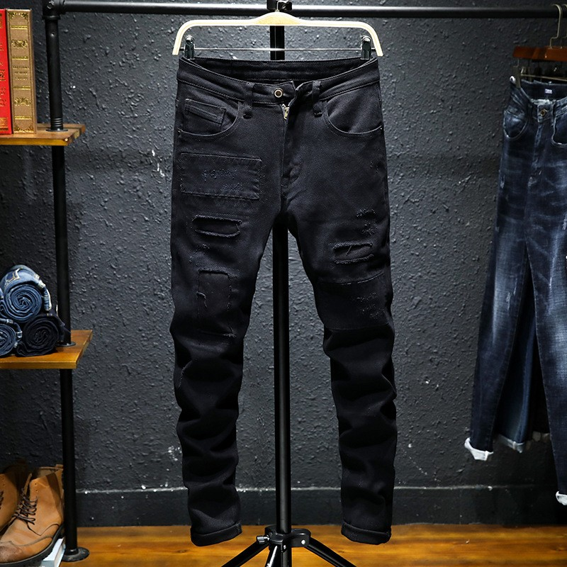 Carmine Juneberry DenimDare™ black ripped stretch jeans for men, showing distressed details and slim fit style.
