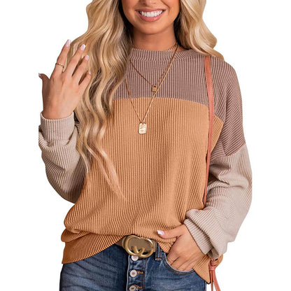 Women’s color block long sleeve crewneck knitted pullover top by Peach Castor, featuring a casual and stylish design.