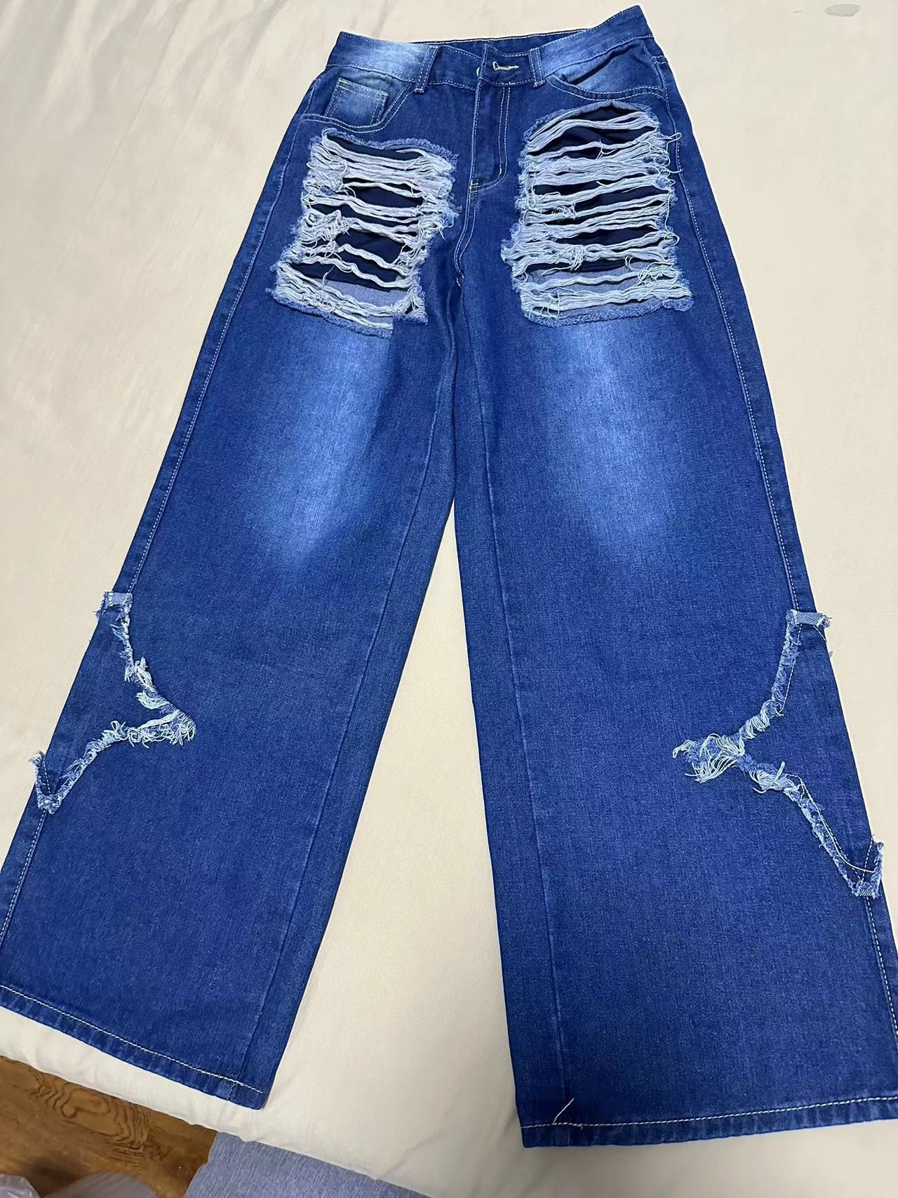 Carmine Juneberry Patch Ripped Street Jeans – Haute Edition 25 with distressed details and stylish streetwear design.