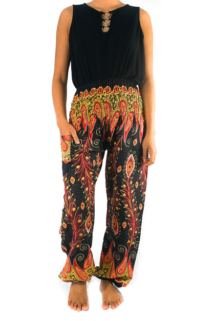 Black peacock boho gypsy pants by Tan Smokey featuring flowing fabric and intricate feather-inspired patterns.