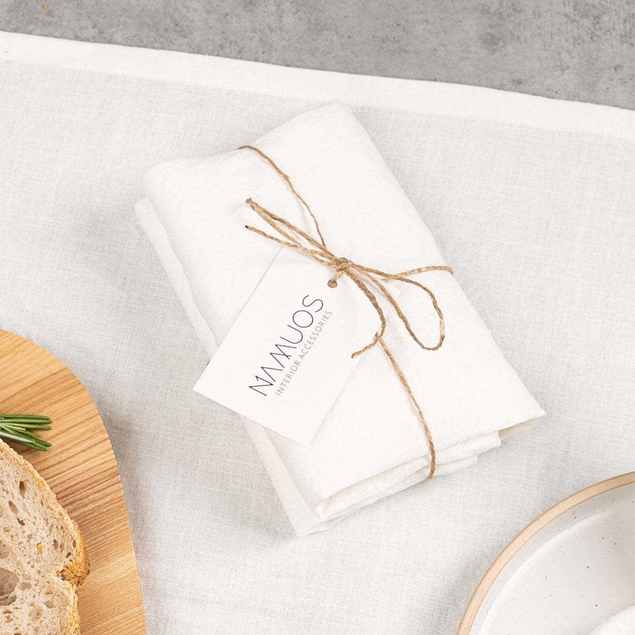 Off-white linen bread bag from Biotite, designed for kitchen use, featuring a natural, breathable fabric suitable for storing bread.