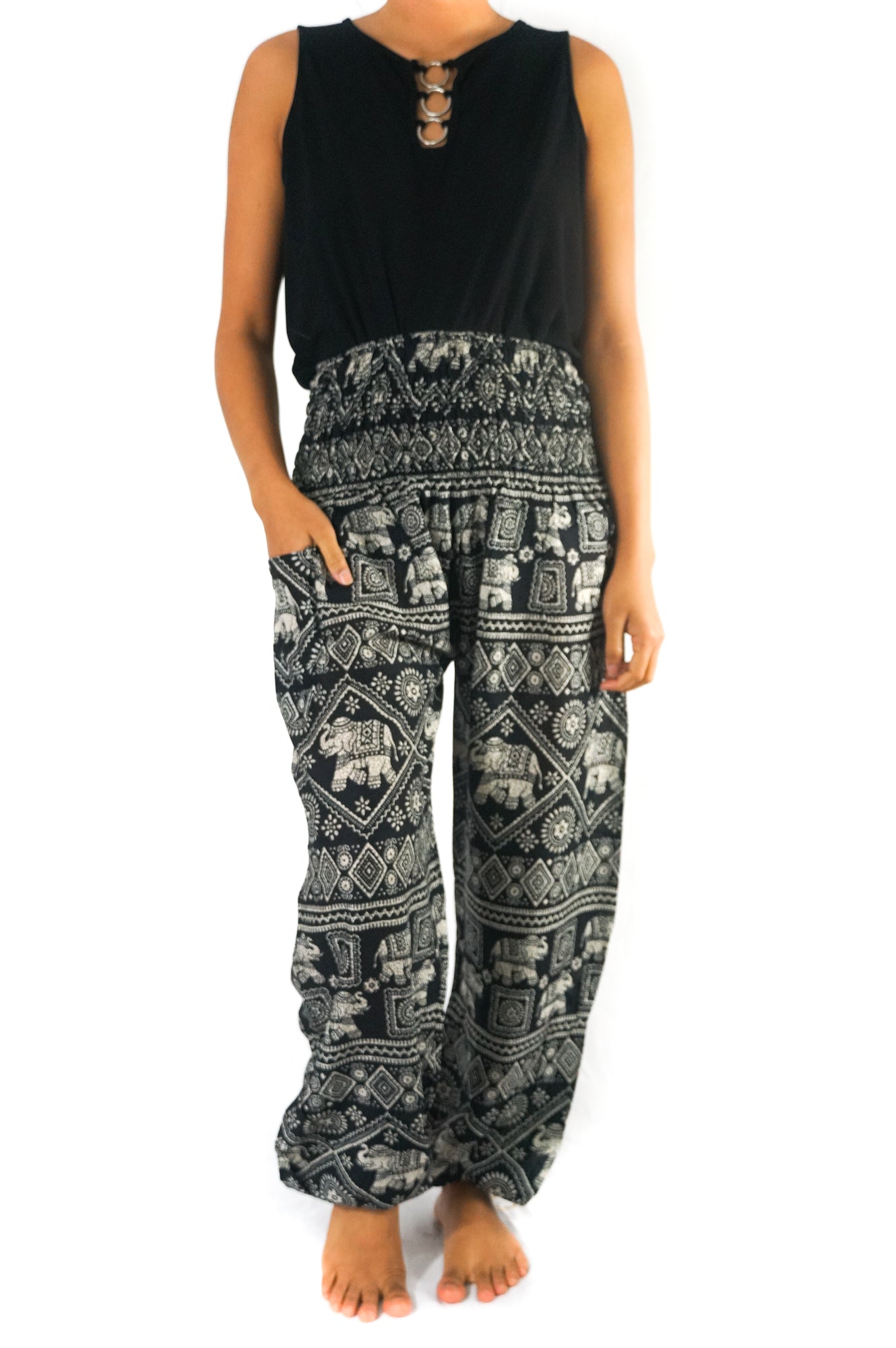Black elephant print boho pants for women, featuring a relaxed fit and hippie style, perfect for yoga and casual wear.