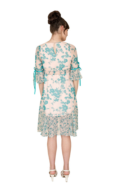 Gray Eos summer floral dress with a lightweight fabric and vibrant floral pattern, flowing design perfect for warm weather.