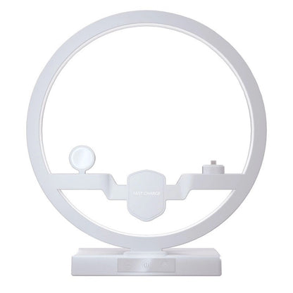 Teal Simba angel wing fast wireless charger with power adapter, sleek mobile and laptop accessory for quick device charging.