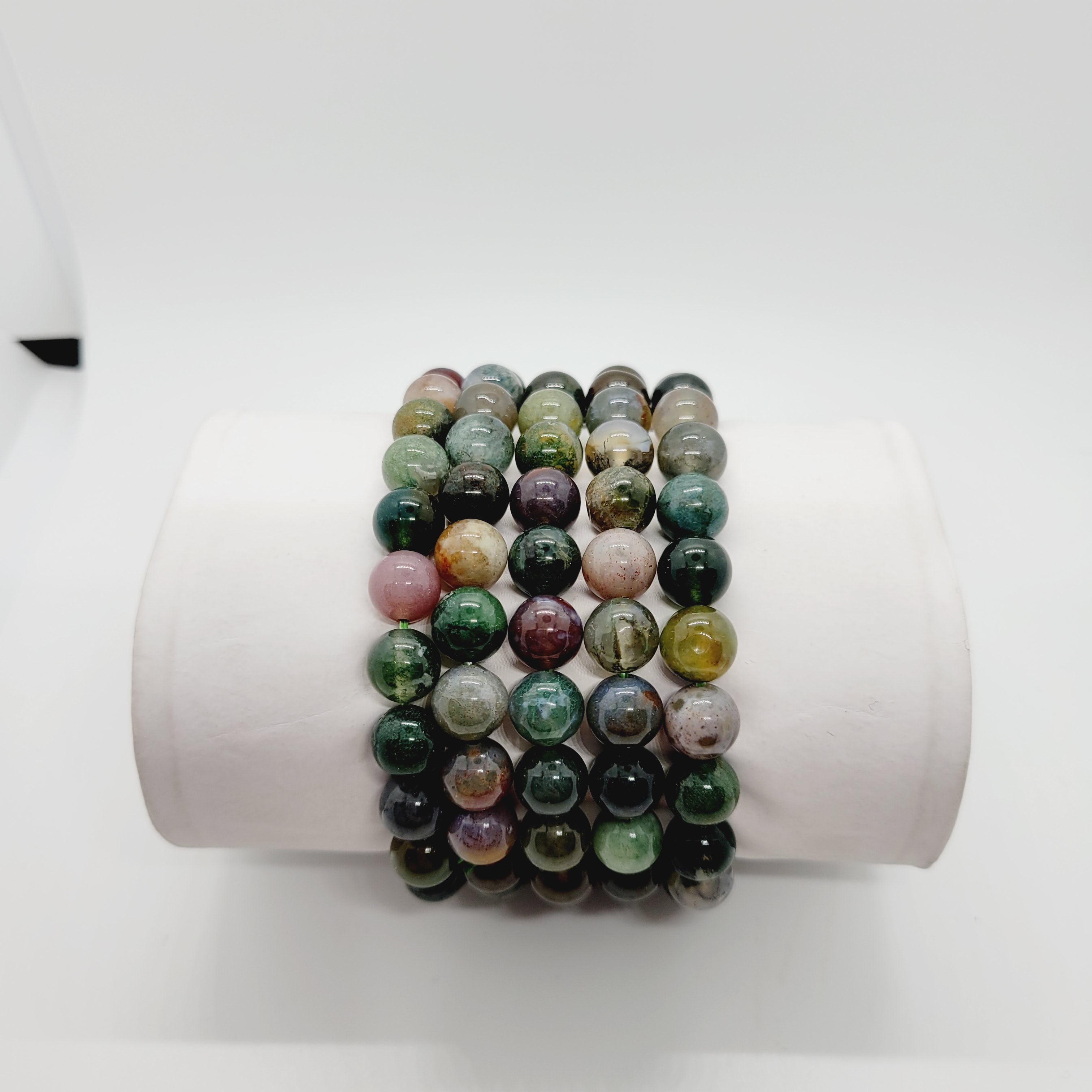 Colorful agate stone bracelet by Olive Coeus featuring semi-precious stones and Reiki healing properties.