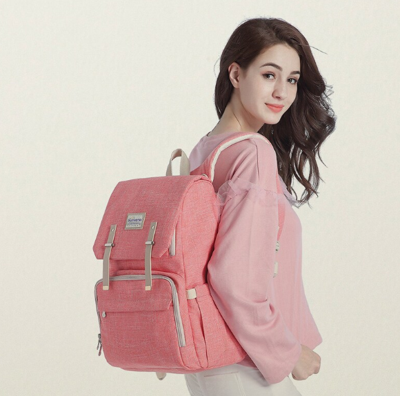 Maroon Chronos canvas diaper bag travel backpack with multiple compartments and adjustable straps for parents on the go.