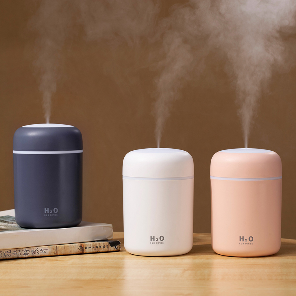 Teal Simba portable air humidifier and essential oil diffuser for car and home, compact and stylish for improved air quality.