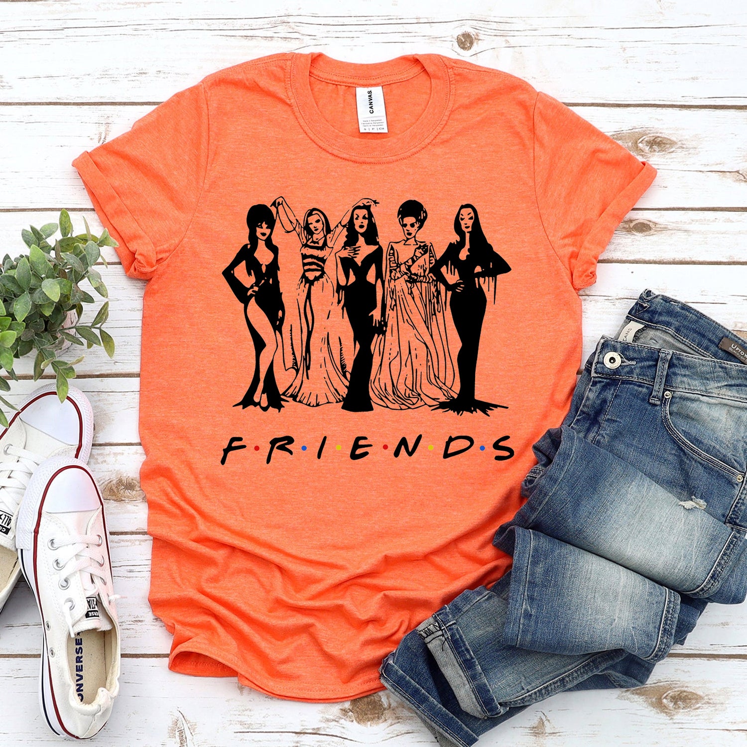 Friends Halloween T-shirt by Agate featuring festive design and comfortable cotton fabric, ideal for Halloween celebrations.