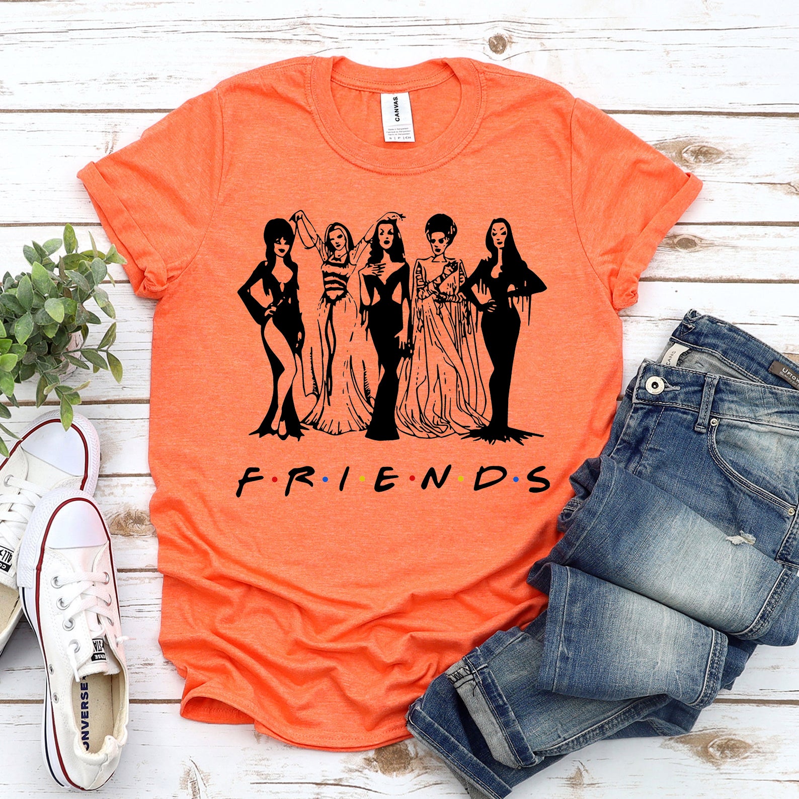 Friends Halloween T-shirt by Agate featuring festive design and comfortable cotton fabric, ideal for Halloween celebrations.