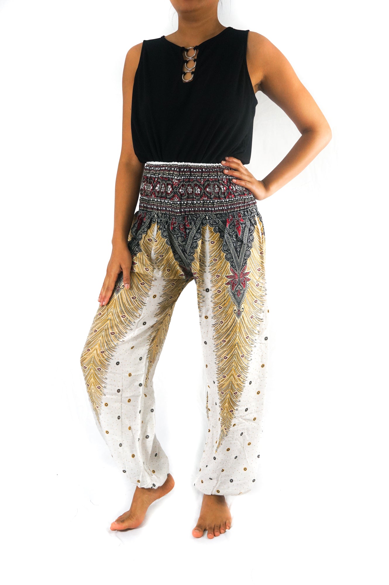 White peacock print boho yoga pants for women by Tan Smokey, featuring a loose, flowy fit and bohemian style.