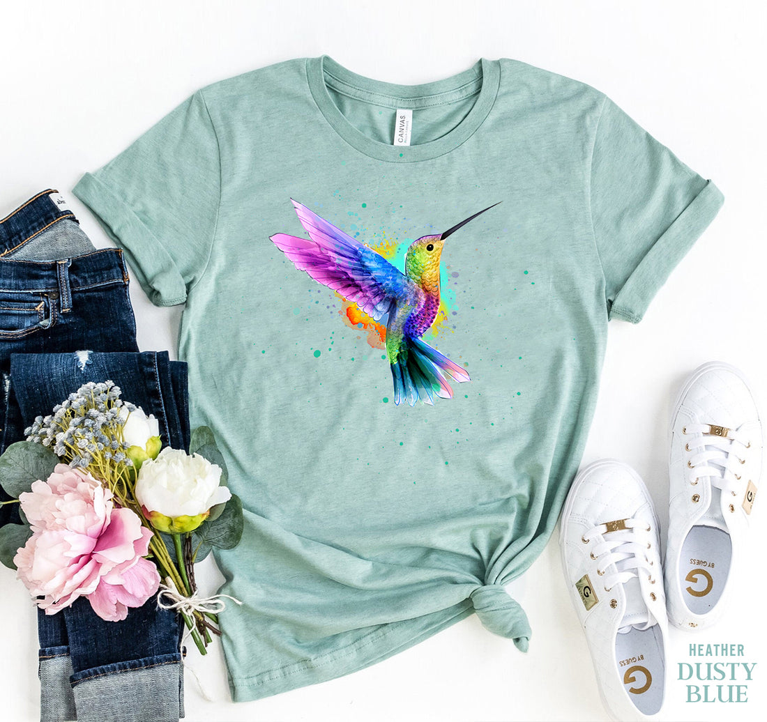 Agate hummingbird T-shirt featuring a colorful bird design on soft fabric, perfect for casual wear.
