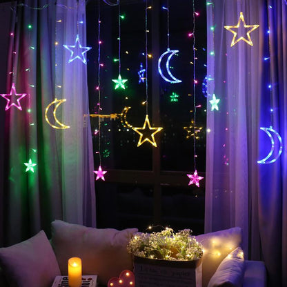 Teal Simba moon and star string LED lights with remote control, ideal for festive or decorative lighting.