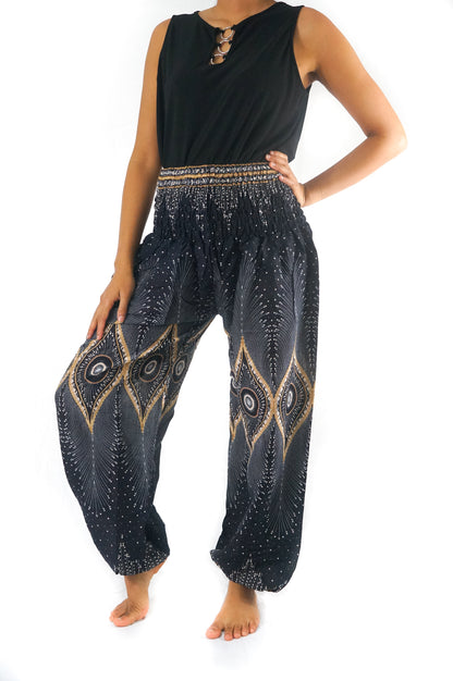 Black PEACOCK Women Boho Pants by Tan Smokey featuring flowy, lightweight hippie yoga pants with peacock print details.
